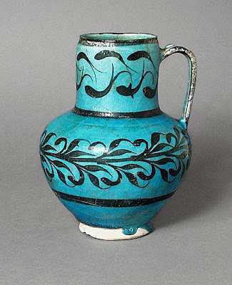 Jug Iran, Kashan Jug, 13th century Ceramic; Vessel, Fritware, underglaze-painted, 7 5/8 x 7 in. (18.7 x 13.6 cm) The Nasli M. Heeramaneck Collection, gift of Joan Palevsky (M.73.5.385) Art of the Middle East: Islamic Department.