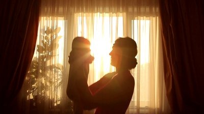 [stock-footage-mother-plays-with-baby-before-window-in-silhouette%255B4%255D.jpg]