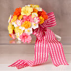 Naomi created this bouquet of Fancy Flours sugar hibiscus, pansies, and daffodils. Naomi created this bouquet of Fancy Flours sugar hibiscus, pansies, and daffodils.