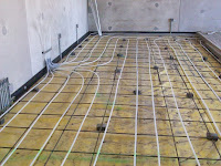 Heated floor under maintenance shop floor
