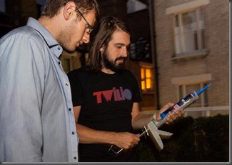 Tom and Gavin with a sealant gun