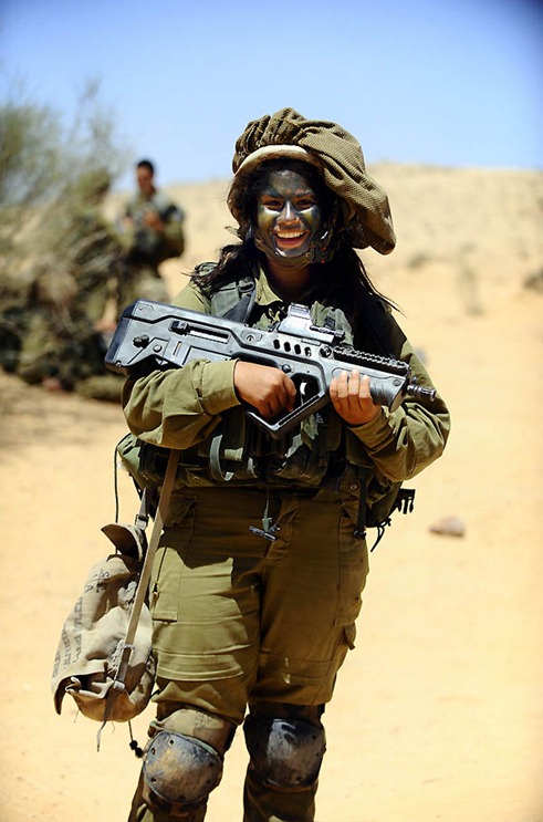 вЂњOptimismвЂќ. A soldier of the Caracal co-ed battalion during a platoon exercise in southern Israel, 2012.