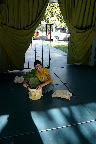 Jen's sister wraps a cactus in some Jenny Pennywood-printed fabric the morning of the wedding.