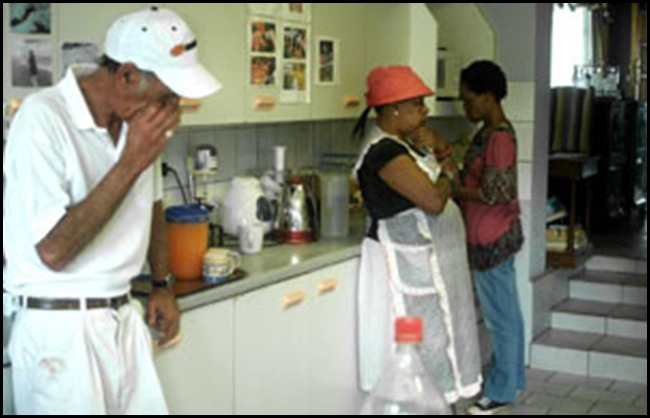 Wilken Wendy widower Mario in kitchen March212011WithWorkers