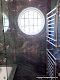Leaded porthole window made from plate glass wet laminated to hand blown glass in bath in private residence in Palo Alto, CA