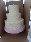 The red velvet cake, in its box.