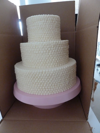 The red velvet cake, in its box.
