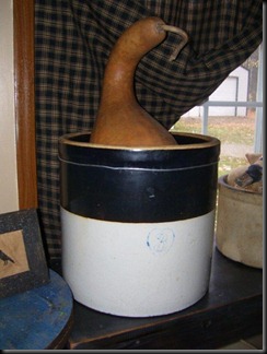 large gourd in crock