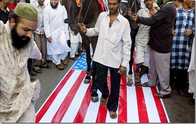 Muslims Walking on U.S. Flag