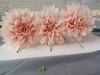 Look again. These babies are made of crepe paper!
Half of the tables featured faux blooms while others boasted fresh flowers.