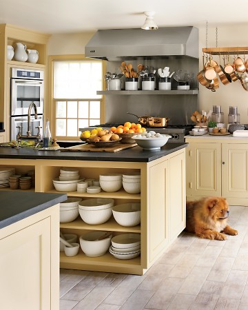 Open shelving allows for easy access to bowls and supplies for an avid chef. (Annie Schlecter/Marthastewart.com)