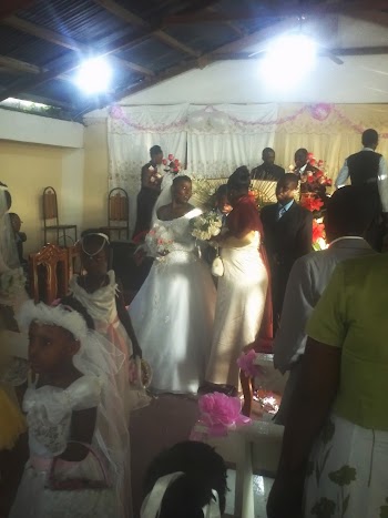 The front of the church with wedding party The front of the church with wedding party