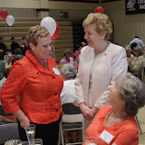 College President Sister Carol Jean Vale greets past Egan Award winners and Reunion Luncheon guests Pat Parrella Orlando 68 (2001) and Elaine Bennett Davey 65 (2003).