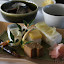 Hassun: Osaka pressed Sushi featuring Mackerel, Prawn and Eff, Sea Bream, minced Chicken Cake covered with Poppy Seeds, small River Fish rolled with Kelp, Petit Arrowhead Bulb pickled with Sweet Vinegar and Ginger