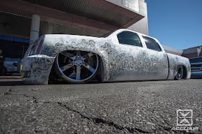 Quad cab Escalade front-clipped Chevy equipped with AccuAir e-Level