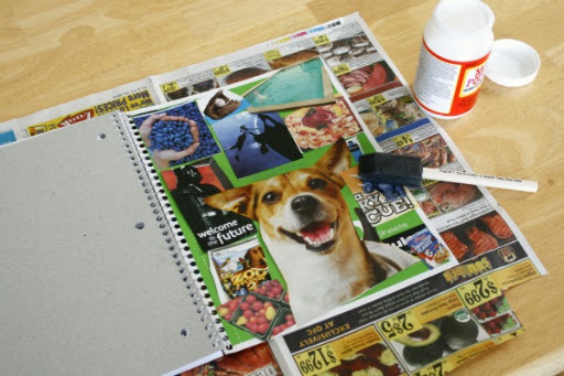 To ensure the images stay on the notebooks, we added a coat of decoupage glue to seal it all in place. Just place down a sheet of newspaper, put your notebook on top, and  add a layer of the glue with your sponge brush and decoupage glue. You may need to use your finger to press some of the newspaper image clippings down, as the glue does make them wrinkle a bit.