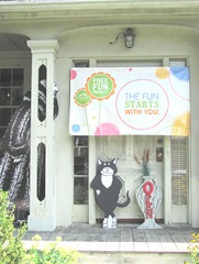 Ed Gorey house front doorway w man and cat