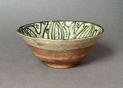 Bowl Iran Bowl, 11th or 12th century Ceramic; Vessel, Earthenware, engobe, incised, underglaze, slip-painted, sgraffiato, 3 1/8 x 7 1/2 in. (7.94 x 19.05 cm) The Nasli M. Heeramaneck Collection, gift of Joan Palevsky (M.73.5.150) Art of the Middle East: Islamic Department.