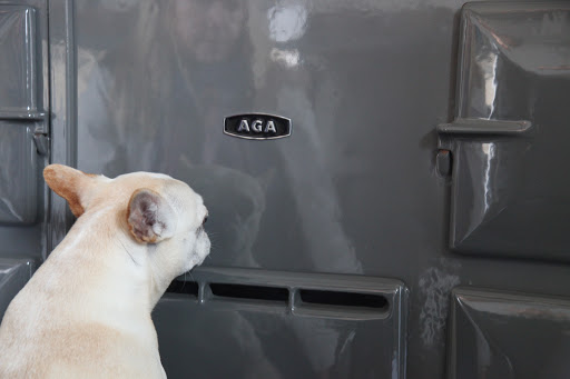Francesca, to be precise, this is an Aga four-oven stove.  Each oven is heated to a different temperature.  Martha uses this kitchen when she has parties in the stable, and this Aga is very versatile.