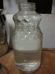 Recycle a 32 oz jar!  Fill it with water.