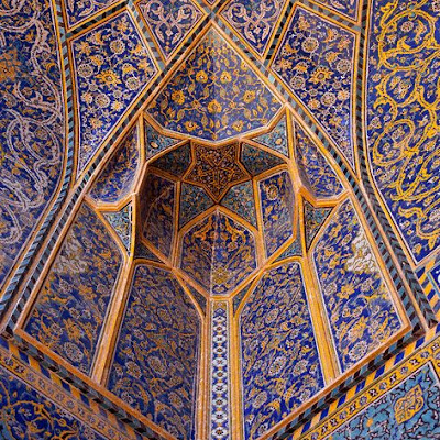 ca. 1970-1995, Esfahan, Iran --- Decorative pale blue tiles adorn the ceiling of Isfahans Imam Mosque. The building is completely covered in the tiles which became a trademark of the city. Iran. --- Image by © CORBIS 4134903780_1120703c16_o.jpg