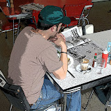 Chris. Five years later he still sits in that chair!