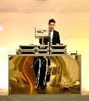 The DJ booth was customized with a gold panel and a calligraphed The DJ booth was customized with a gold panel and a calligraphed