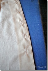 The left center back piece with the buttonholes.