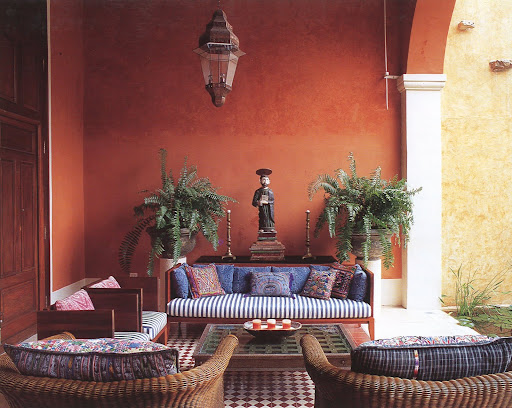 So much to love about this open room - the potted ferns, beautiful hanging lantern, gorgeous outdoor fabric and the antique 'Santo' statue holding court. So much to love about this open room - the potted ferns, beautiful hanging lantern, gorgeous outdoor fabric and the antique 'Santo' statue holding court.