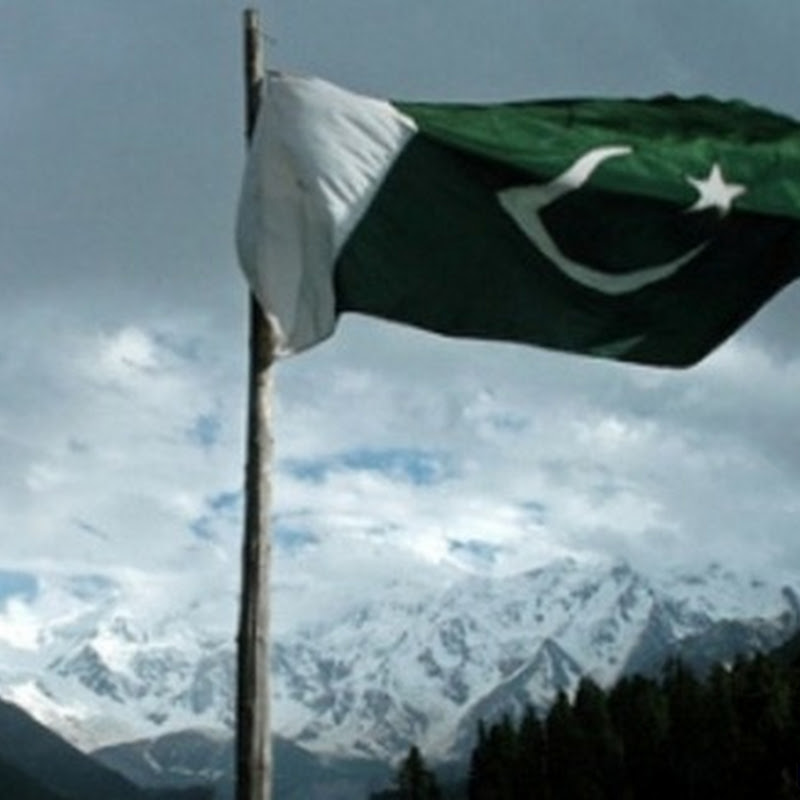 Murree Mountains with snow and Pakistan Flag