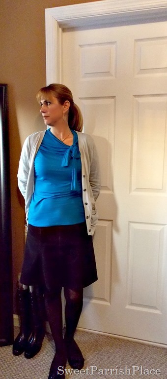 Blue bow shirt, grey cardigan, brown skirt and tights