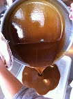 Use caution while pouring the caramel into the pan. Use caution while pouring the caramel into the pan.