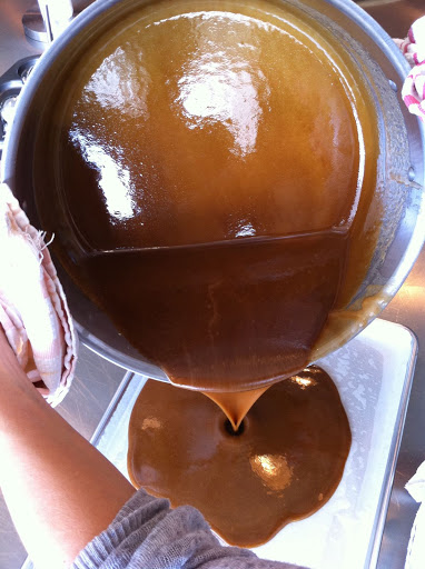 Use caution while pouring the caramel into the pan. Use caution while pouring the caramel into the pan.