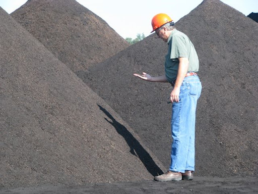 A City Utilities employee inspects the 50 ton pile of 