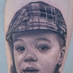 Boy in Plaid Hat