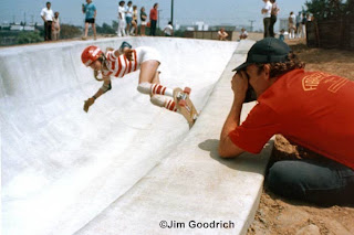 Warren Bolster trying always to get the best shots as Laura traverses back down the bowl at Carlsbad Skatepark