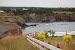 Towards the beach, down the hill.