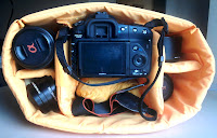 The padded internal camera area can be  completely removed to turn the bag into a normal backpack with a single large compartment. The central partition in the main bag body also opens up