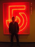 Asian Playboy In Front Of The Channel 5 Logo