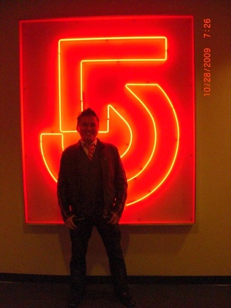 Asian Playboy In Front Of The Channel 5 Logo, Asian Playboy