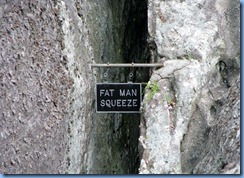 8684 Lookout Mountain, Georgia - Rock City, Rock City Gardens Enchanted Trail - Fat Man Squeeze sign