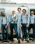 For a wedding in Round Mountain, Texas, groomsmen wore vintage-wash Levi's 501 jeans, pale blue button-down shirts, and suspenders. Reversible bow ties (chambray on one side, ivory with red polka dots on the other) were made by the mother of the groom. For a wedding in Round Mountain, Texas, groomsmen wore vintage-wash Levi's 501 jeans, pale blue button-down shirts, and suspenders. Reversible bow ties (chambray on one side, ivory with red polka dots on the other) were made by the mother of the groom.