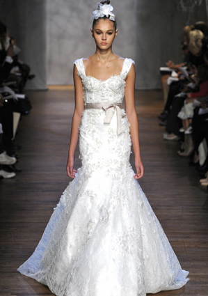 This gown by Monique Lhuillier would show off Kate's figure. It feels pretty and romantic, too.