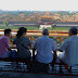 Park-goers looking out at the Forbidden City from Ten Thousand Springs Pavilion on Coal Hill, Beijing.