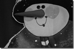 A friendly snowman smiles from a door in the Business Office. A friendly snowman smiles from a door in the Business Office.