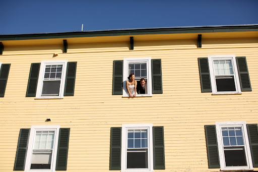 Before the ceremony, Leslie and Randy pop out to view the scenery and guests waiting below.