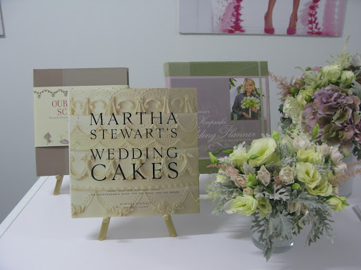 Books make a great gift for any bride. Our Cake book is  inspirational and has how-tos. Our planning binder is a great complement to our online tools...after all, you need a place to keep swatches, contracts, etc. especially for when you're visiting vendors. Matthew Robbins, made totally gorgeous arrangements.