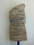086 -Tian'anmen - 1998<br />
H 100 x 48<br />
Bois sculpté