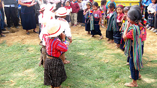 6 and 7 year old children dancing at opening ceremony Sienna Project 2011 Guatemala trip to help build school in Palanquix, Solala, Guatemala. Photos by TOM HART