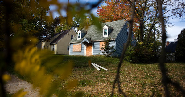 Boarded up suburban home in Ohio, 2011. The recession and the foreclosure crisis hit the suburbs of Cleveland, like Warrensville Heights, particularly hard. The poor population in America’s suburbs rose by more than half after 2000. Dustin Franz for The New York Times